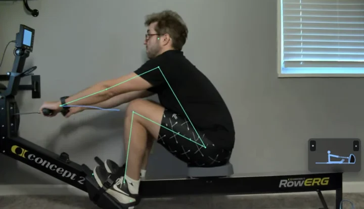 Recorded demo at the catch with knees bent and arms extended.